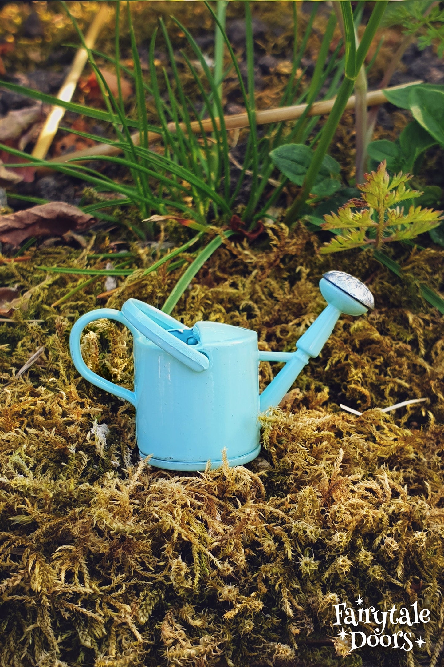 Blue fairy garden watering can